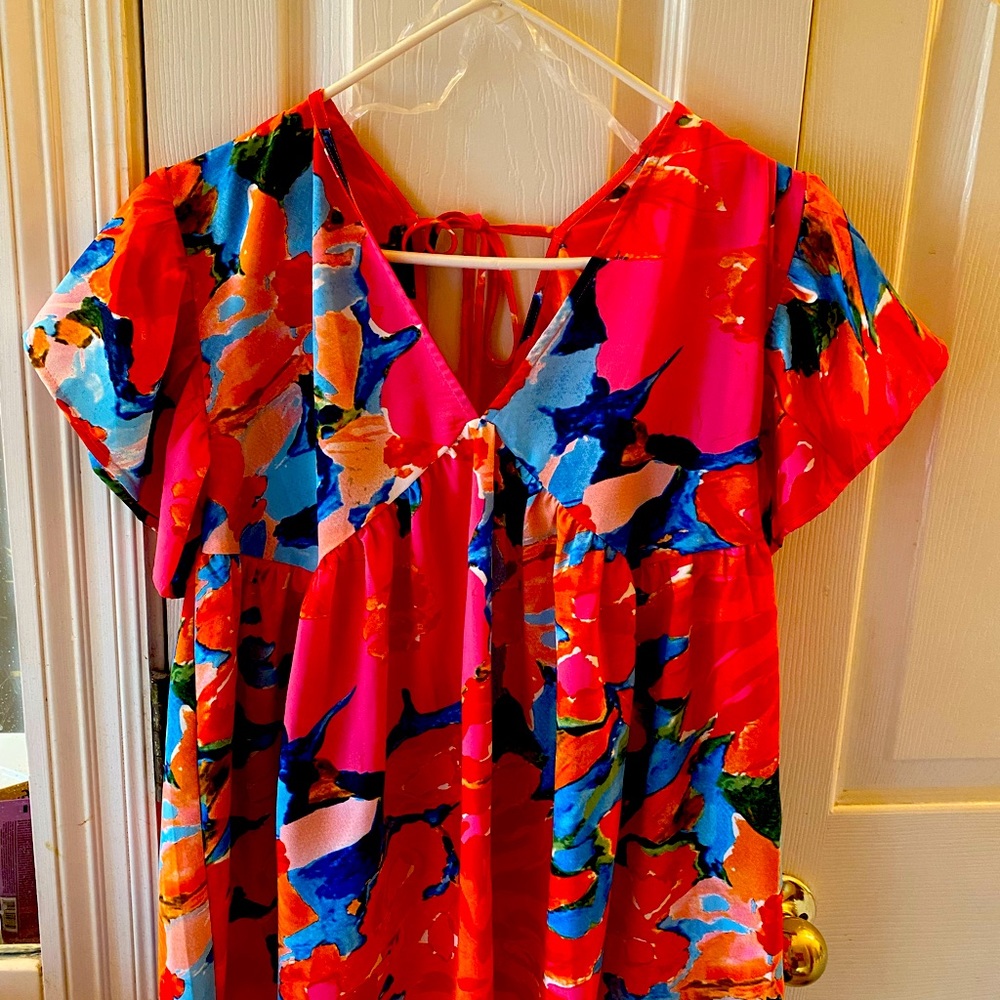 New Entro multi colored blouse. New without tags, never been worn .